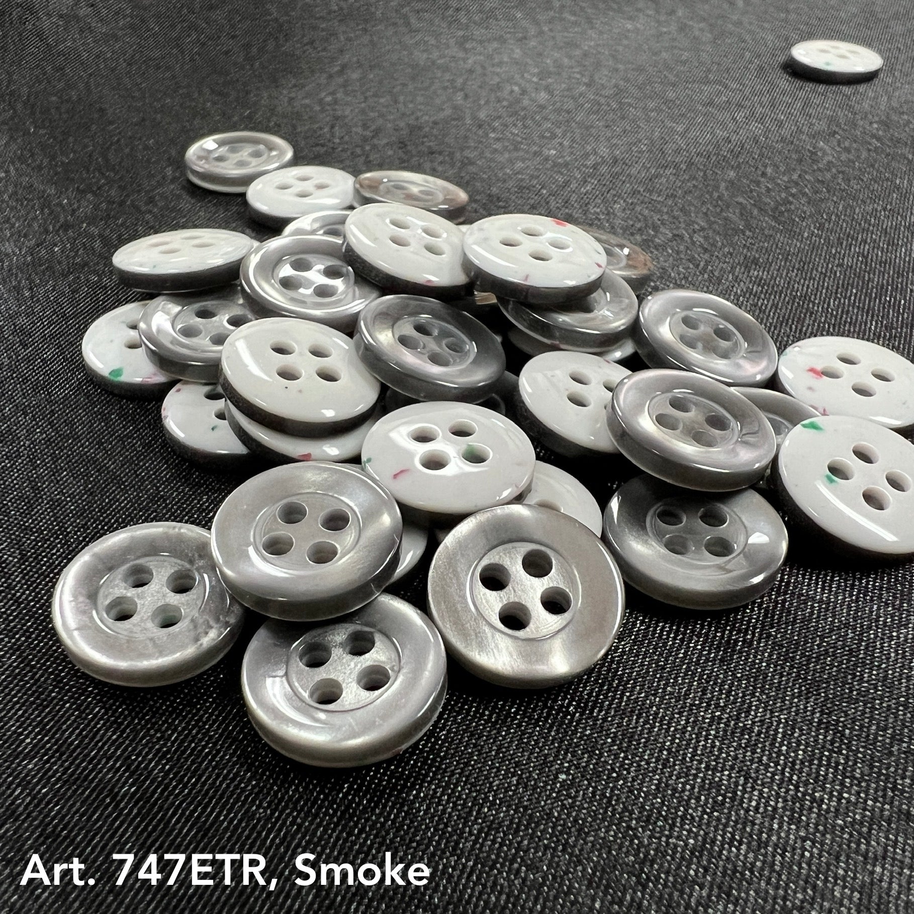 Gray 4 hole sewing buttons for clothing by Buttonology Inc. in various sizes and styles
