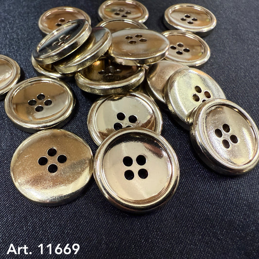 Gold Plated Nylon Button shiny four hole round jacket buttons stacked on black fabric by Buttonology Inc