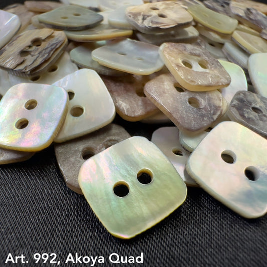 Assorted natural shell buttons in Akoya Quad button design by Buttonology Inc