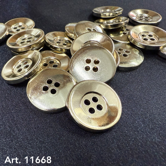 shiny gold 4-hole buttons by Buttonology Inc displayed on black fabric for sewing and craft projects