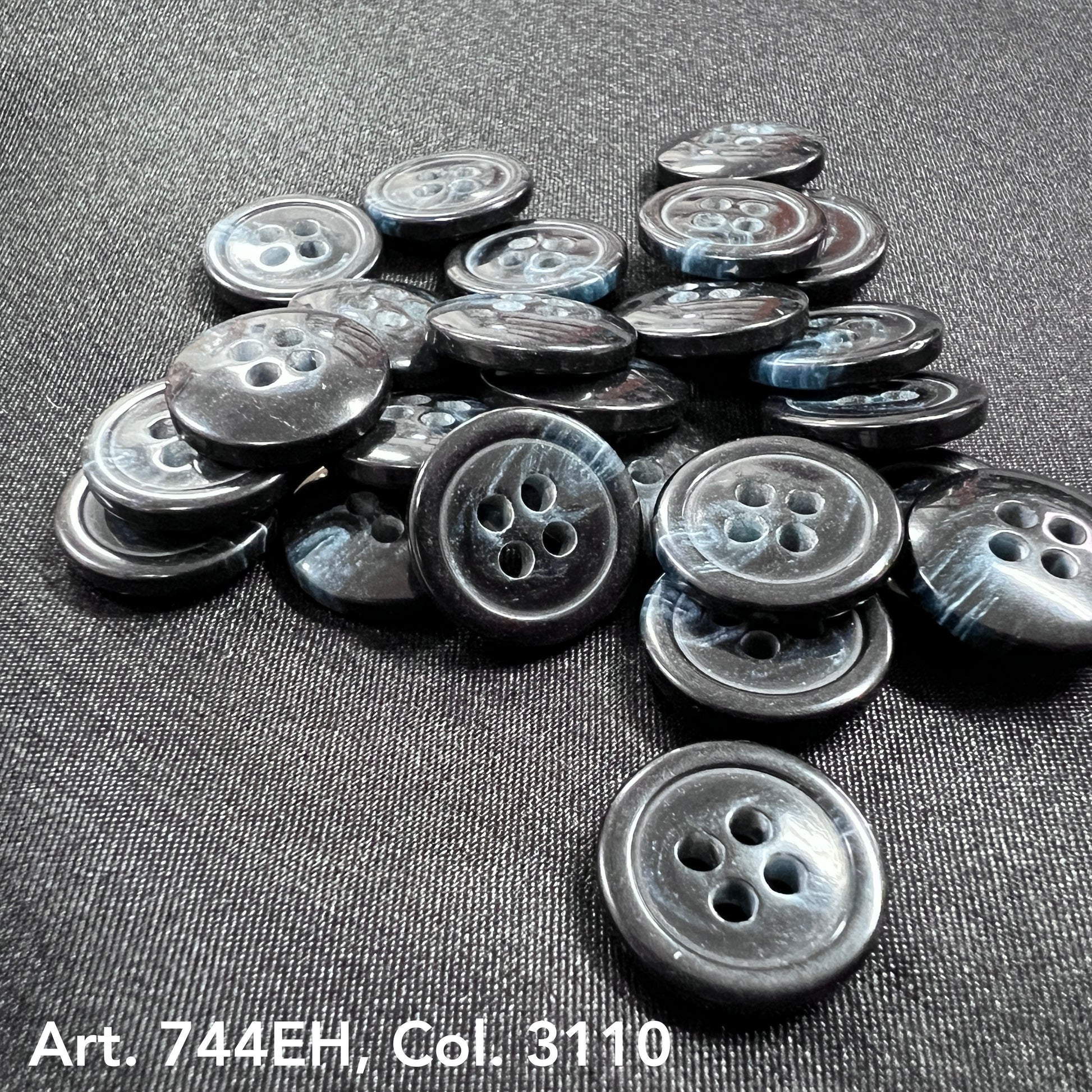 Buttonology Inc fort horn effect four hole buttons glossy black marbled sew on buttons on dark fabric