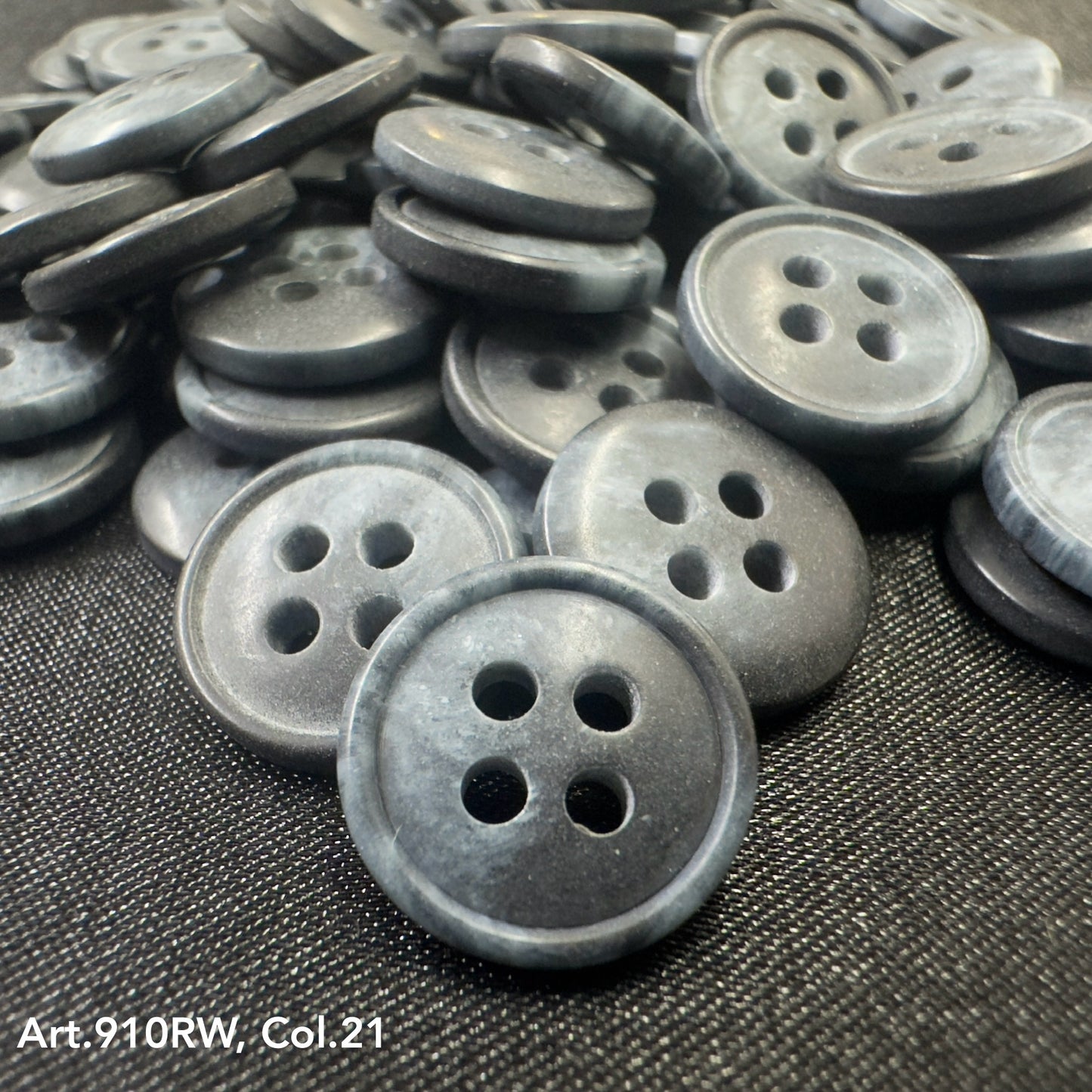 Buttonology Inc gray marbled four hole plastic buttons on black fabric pile coat buttons for sewing