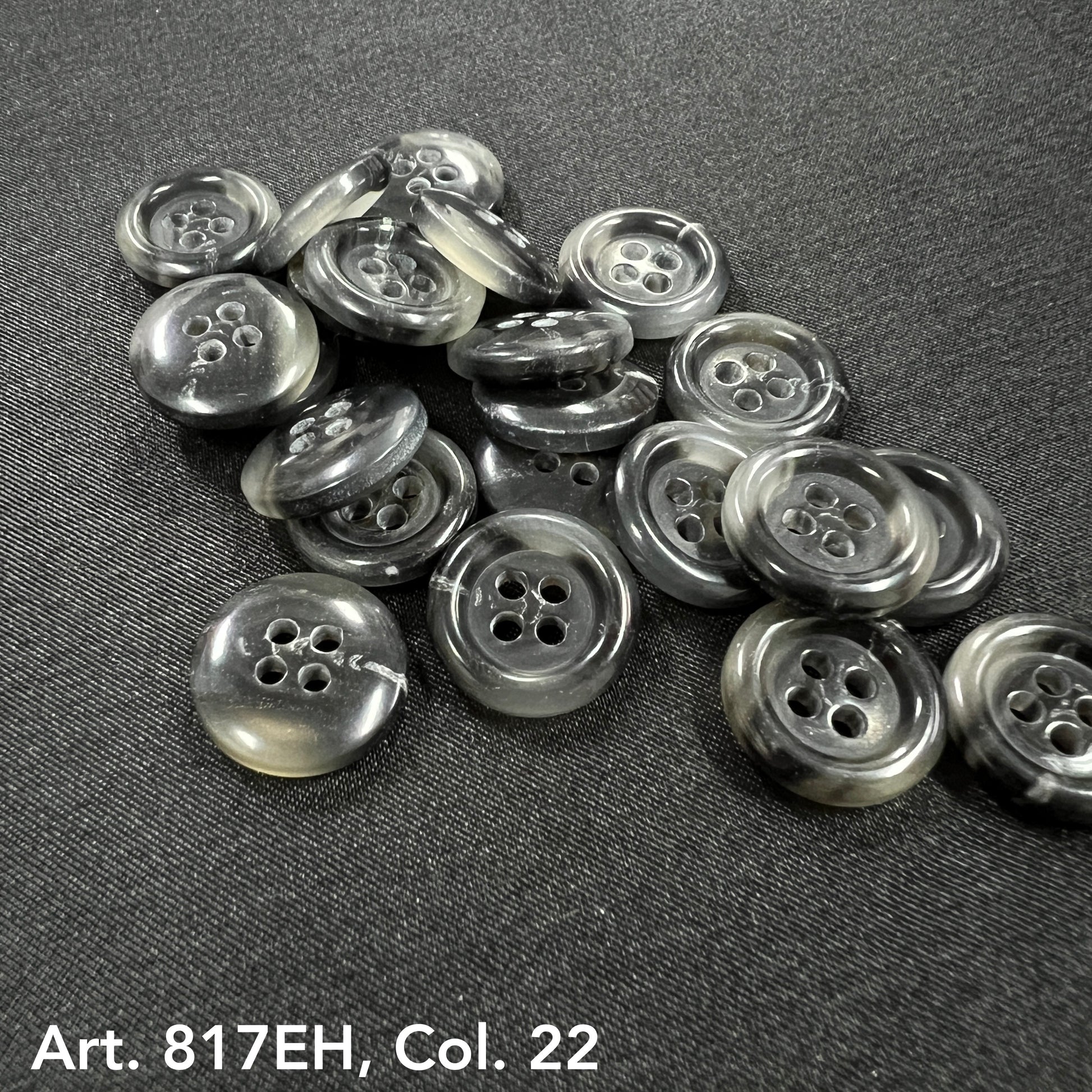 Glossy gray four-hole buttons from Buttonology Inc premium sewing buttons online
