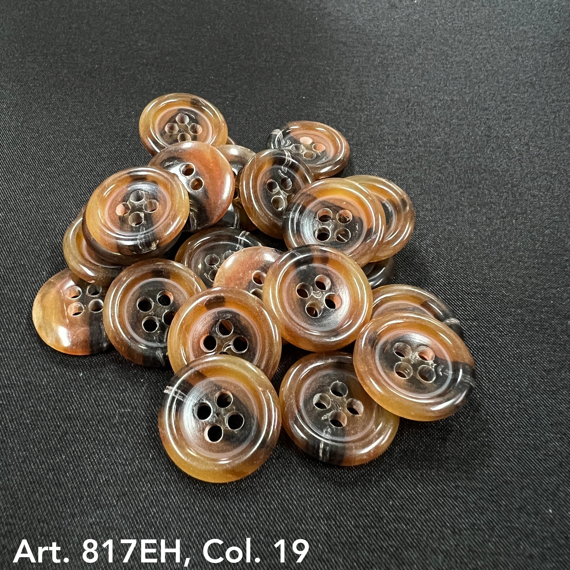 Round brown and black buttons with four holes from Buttonology Inc premium sewing buttons online