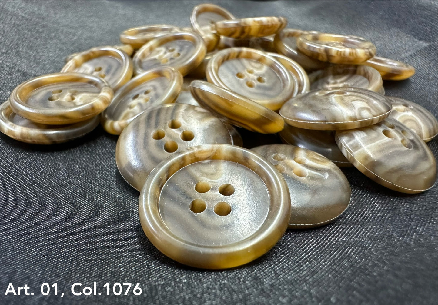 Buttonology Inc marbled brown four hole buttons on dark fabric premium shirt buttons for sewing