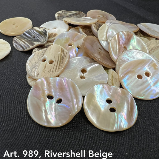 Beige rivershell buttons by Buttonology Inc in various shapes and natural shiny textures