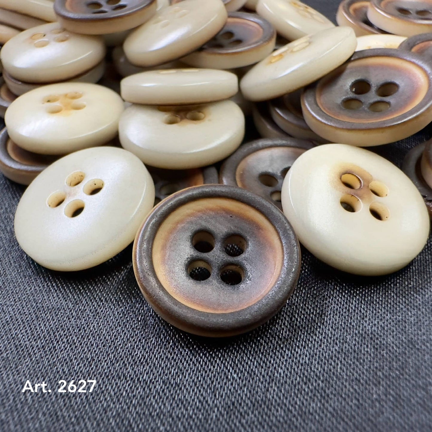 Burnt corozo buttons eco-friendly by Buttonology Inc with natural color variations and four holes