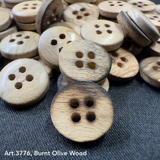 Assorted burnt olivewood buttons with four holes, perfect for crafts and garment repair