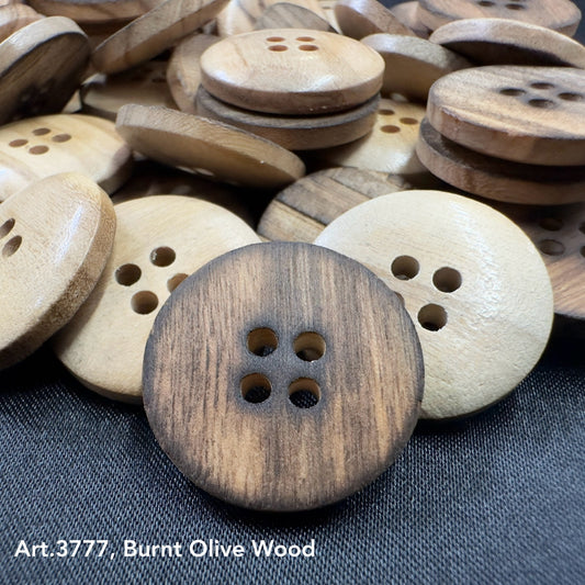 Assorted burnt olivewood buttons featuring natural textures and three holes for versatile crafting use