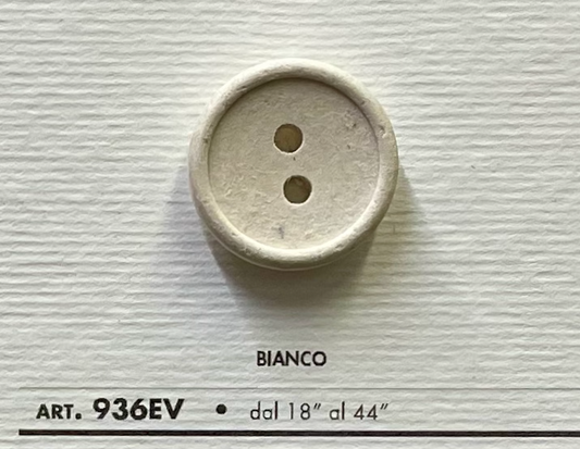 Eco-Velvet Eco-Friendly white two-hole button by Buttonology Inc on textured background