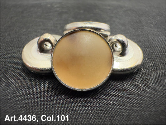 Horn shank button for coats by Buttonology Inc with round beige center and silver shank backing