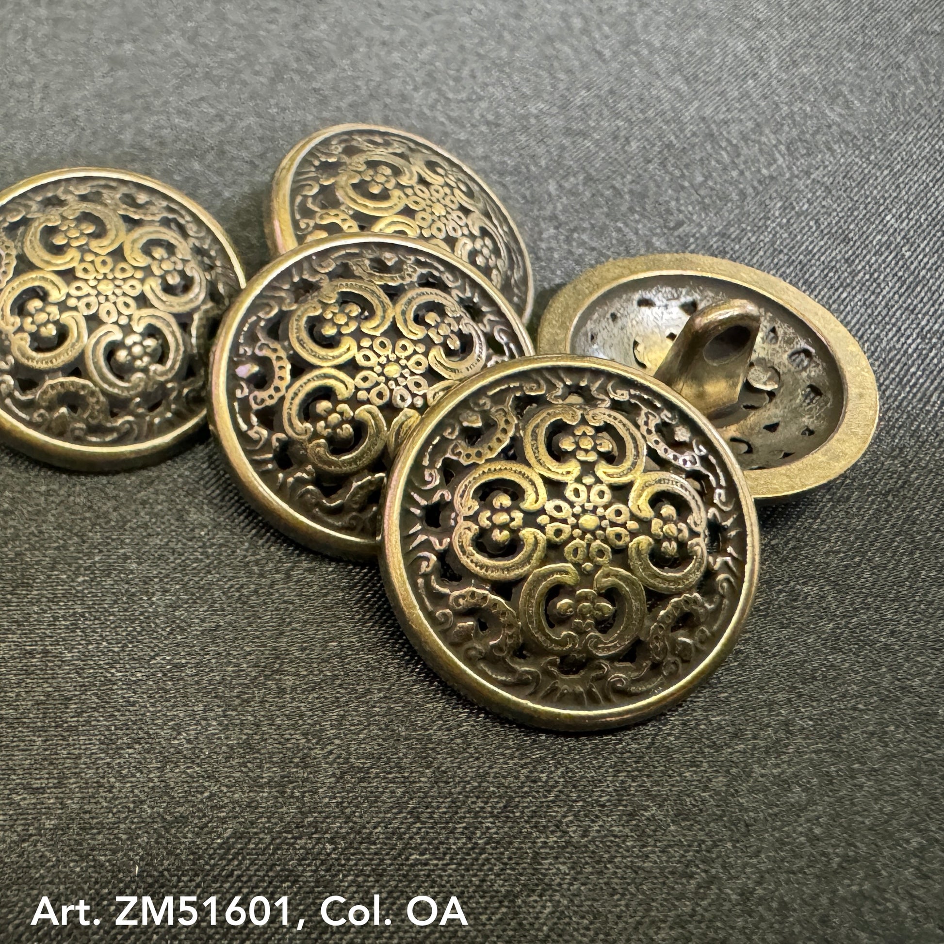 Metal decorative sewing shank buttons with intricate vintage floral design by Buttonology Inc