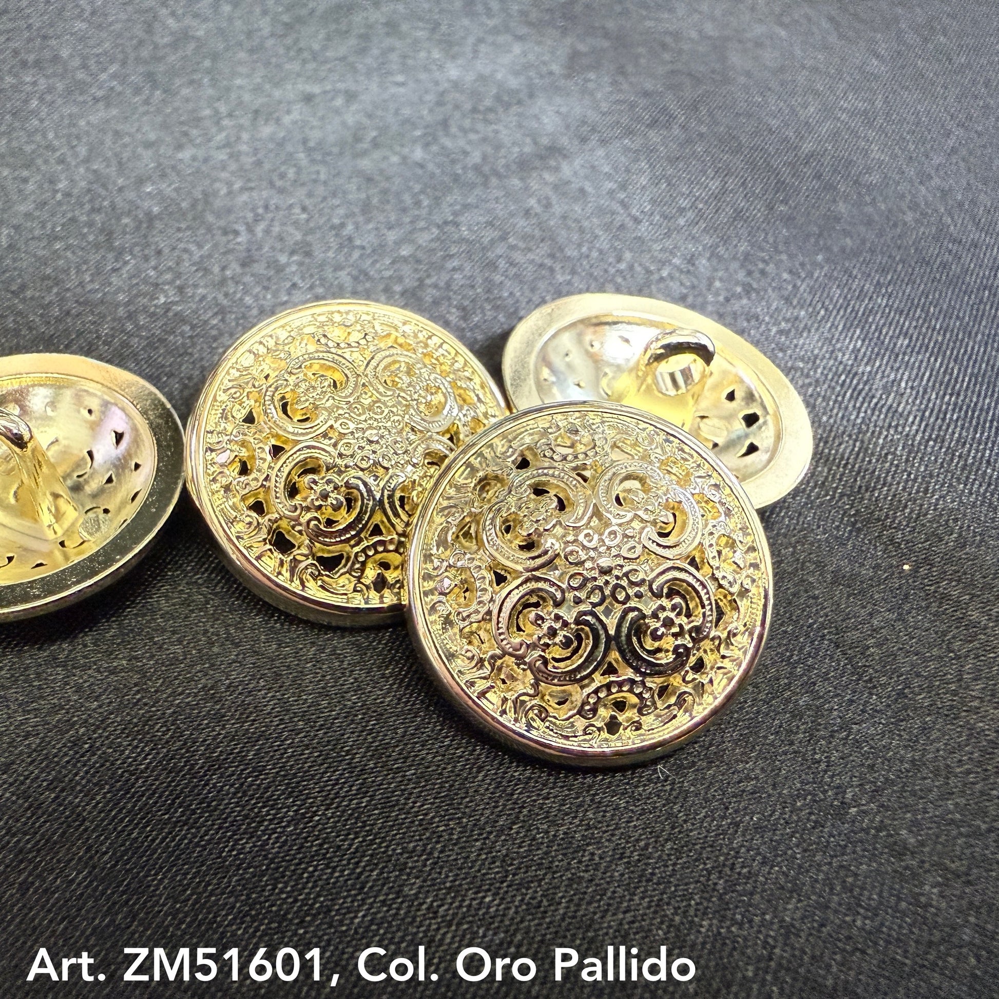 Metal decorative sewing shank buttons with intricate gold filigree design from Buttonology Inc