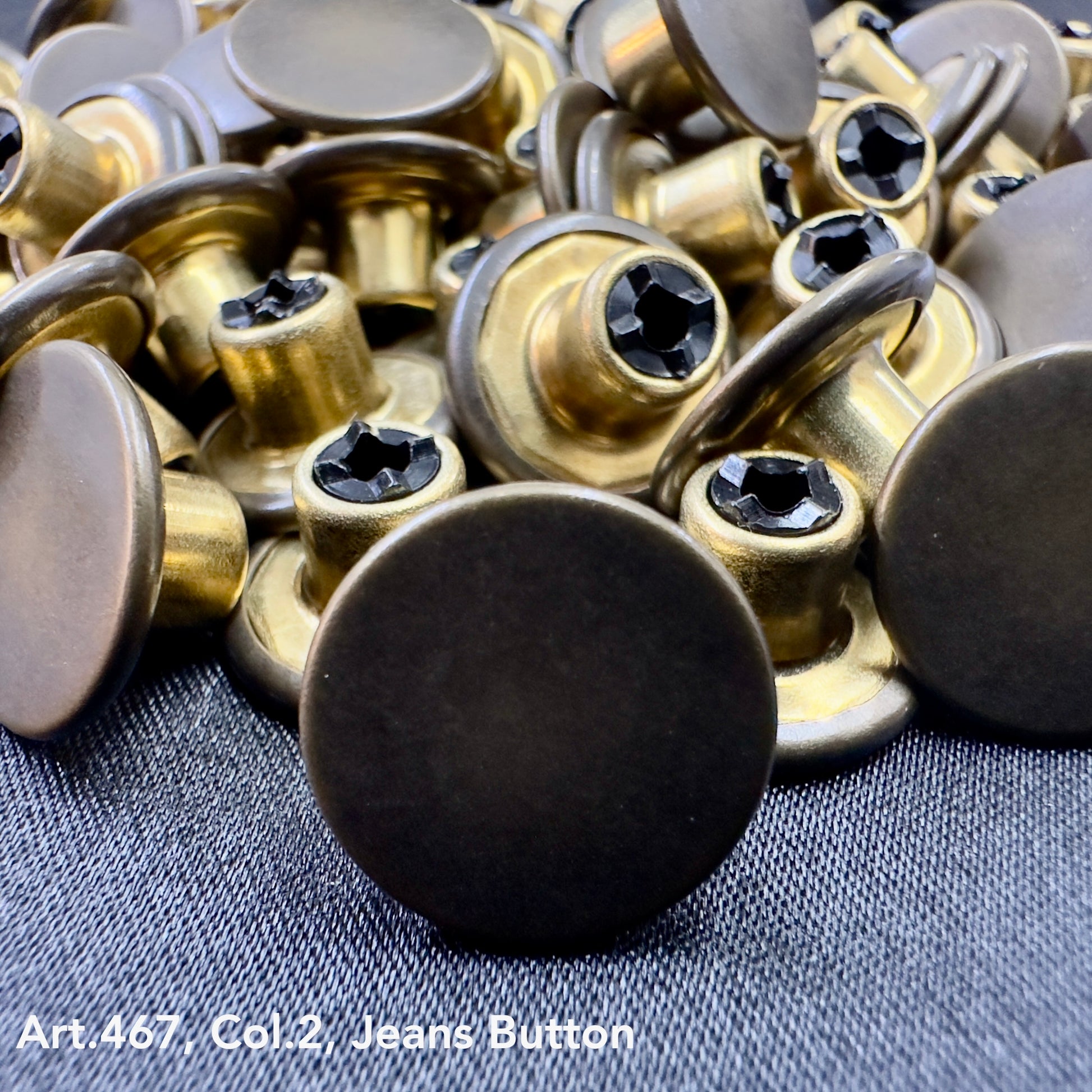 Metal jean buttons for sewing in antique brass finish, perfect for DIY denim projects