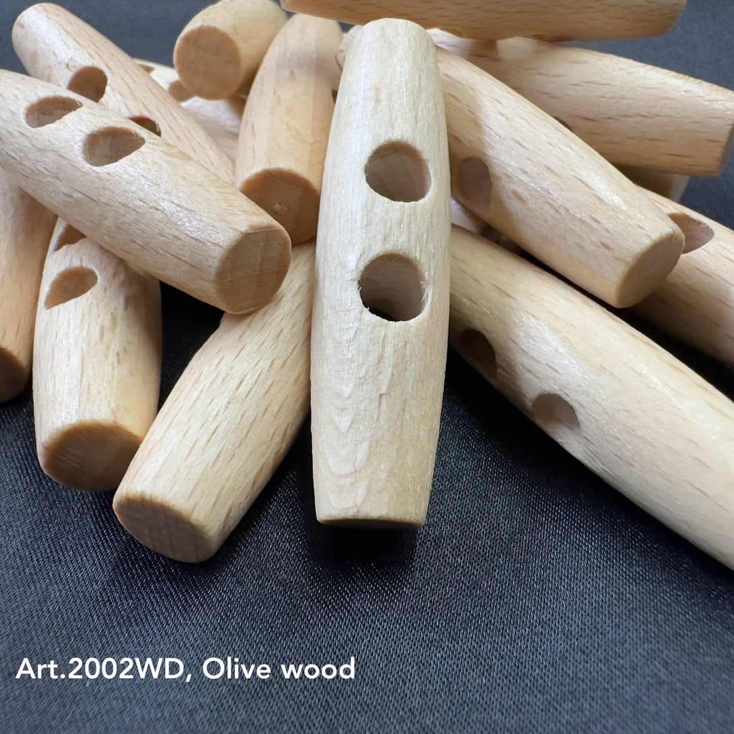 Natural wood toggle buttons handcrafted from olive wood with two holes for sewing