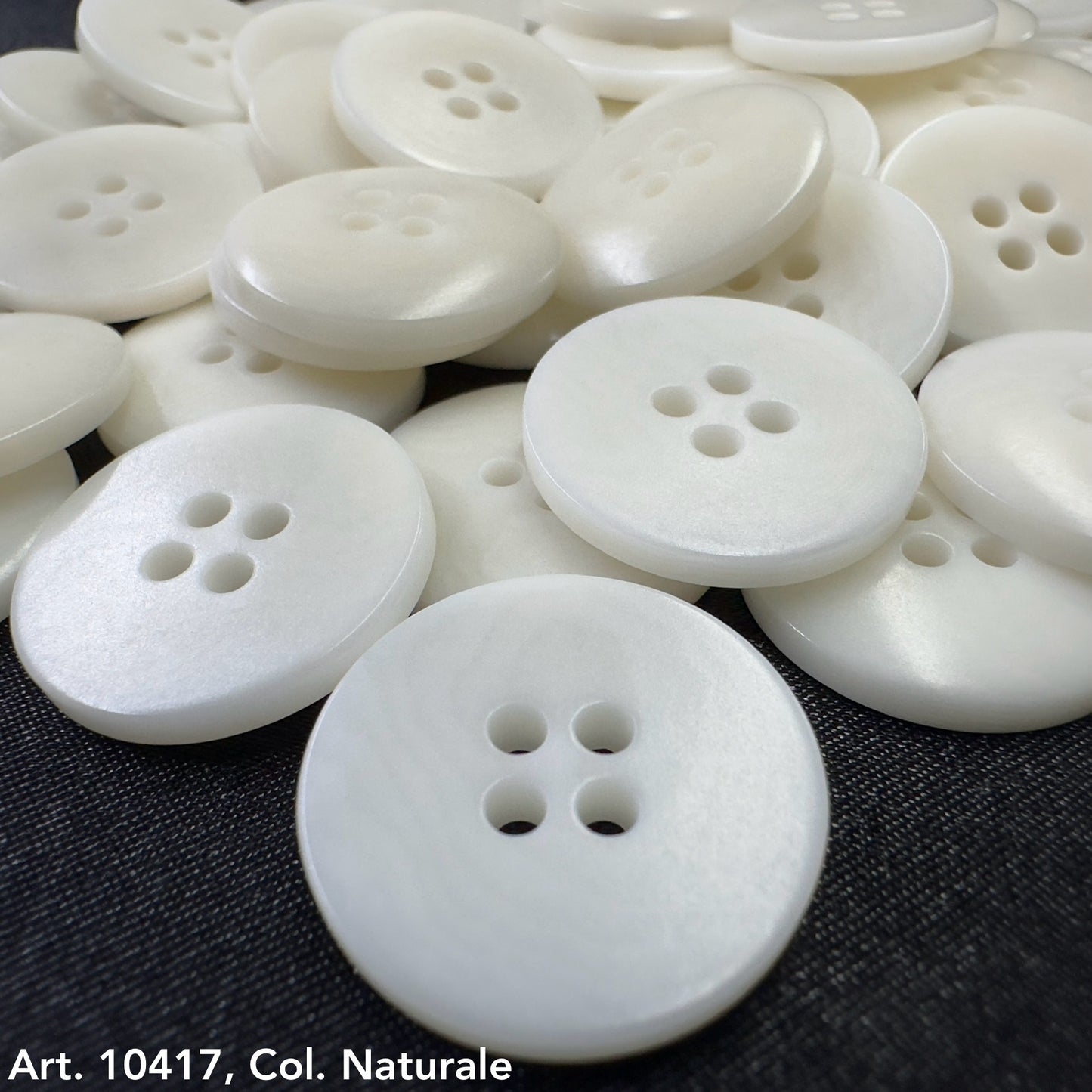 White round buttons from Buttonology Inc, an example of sustainable clothing accessories for eco-friendly fashion
