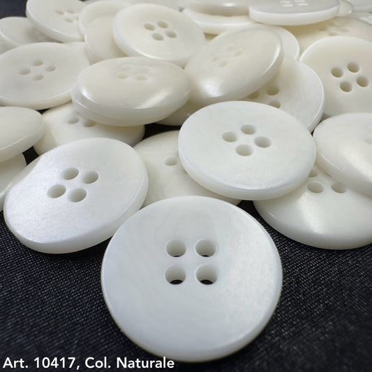White round buttons from Buttonology Inc, an example of sustainable clothing accessories for eco-friendly fashion