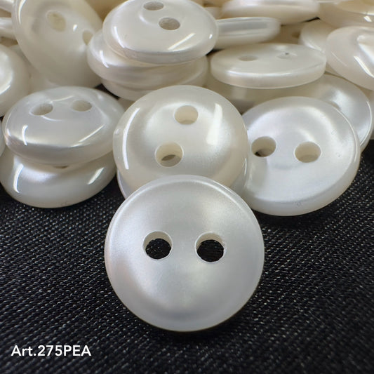 Pearlized novelty buttons from Buttonology Inc with a smooth glossy finish and two holes