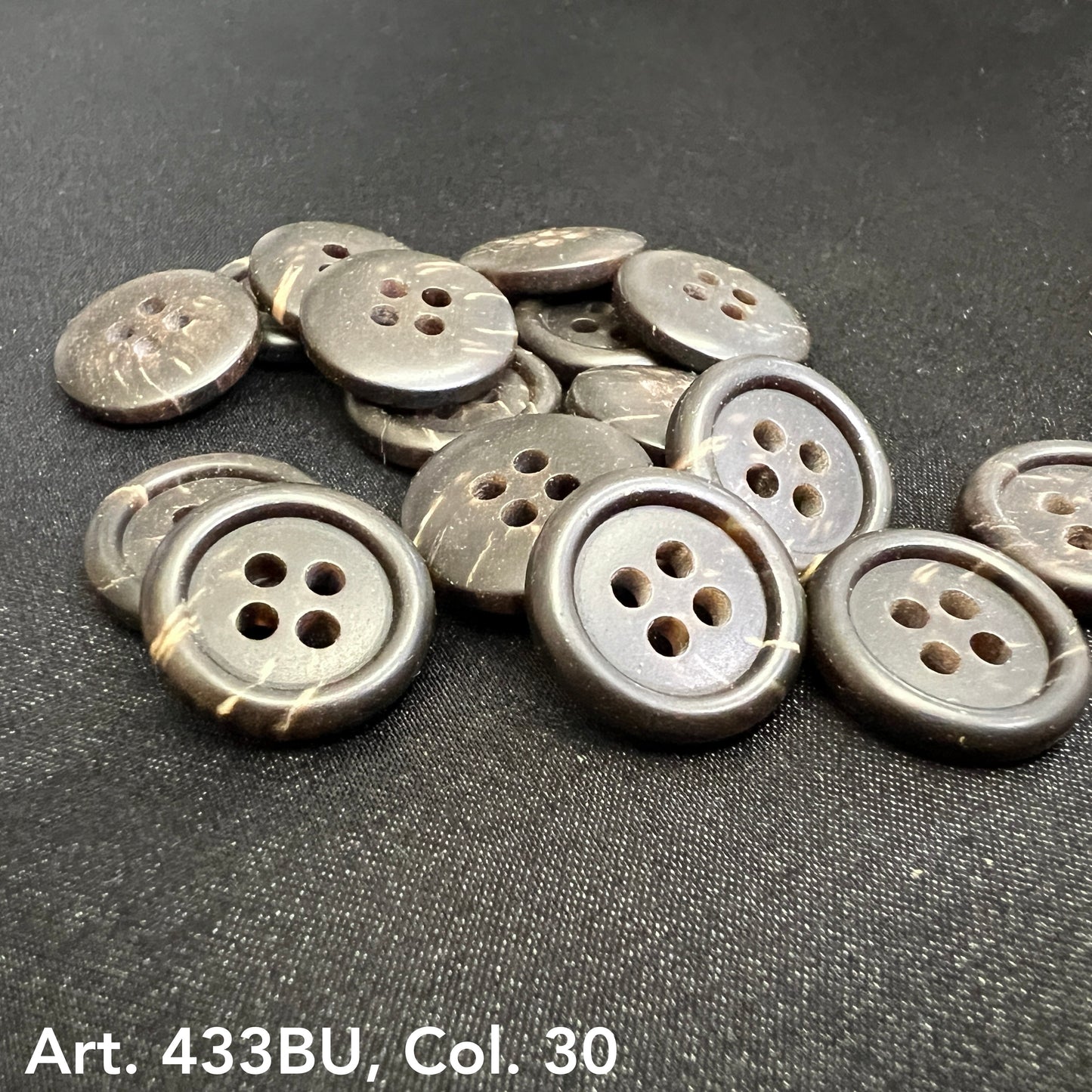 Premium 4-hole sewing buttons in brown featuring a glossy finish and intricate design