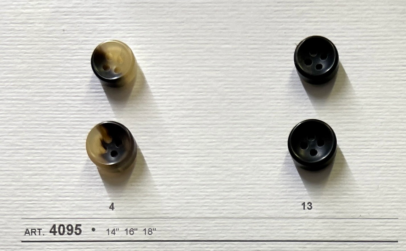 Real horn buttons for suits by Buttonology Inc featuring two color options with four holes and various sizes