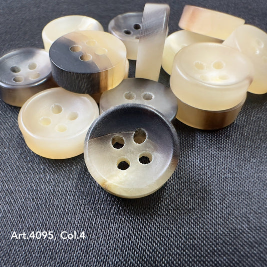 Real horn buttons for suits in a mix of light and dark shades by Buttonology Inc