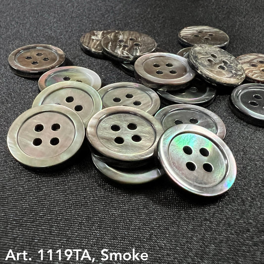 Close-up of real shell buttons in smoke color with a glossy finish from Buttonology Inc