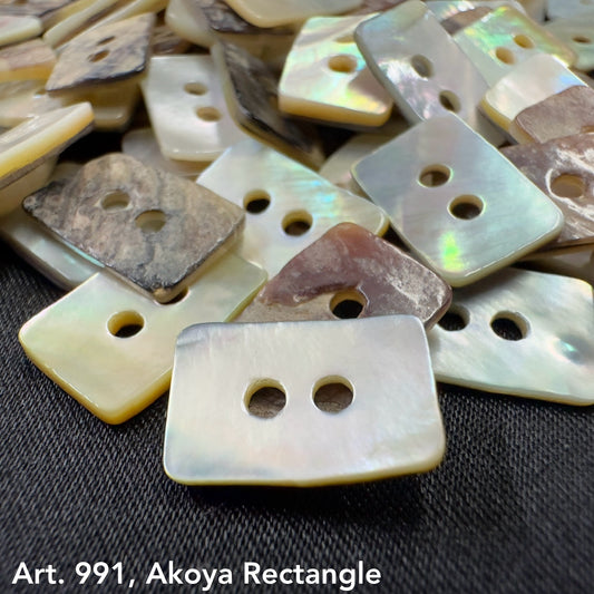 Rectangle shell buttons for clothing in various natural shades by Buttonology Inc