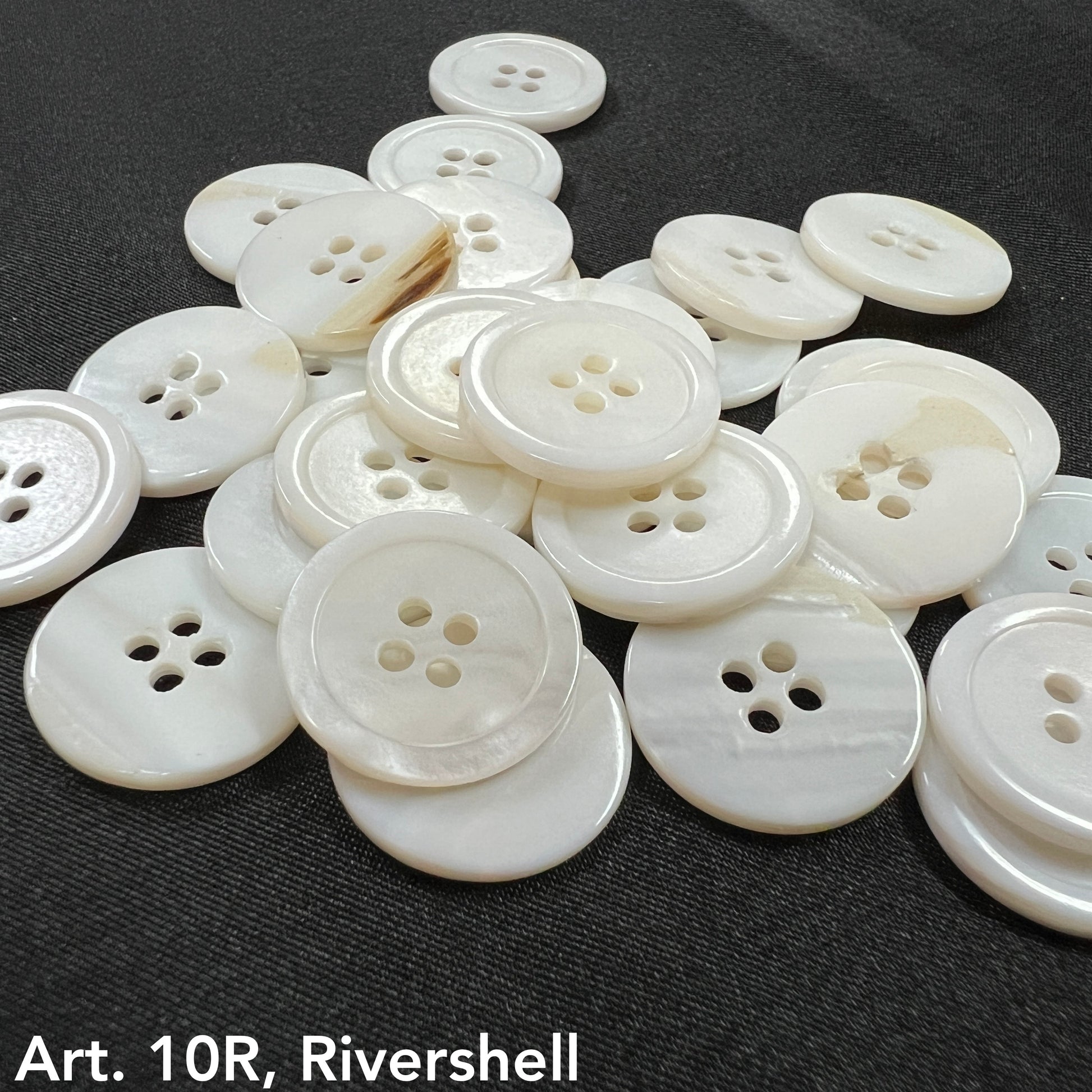 High-quality Rivershell buttons from Buttonology Inc with a smooth, glossy finish and four holes
