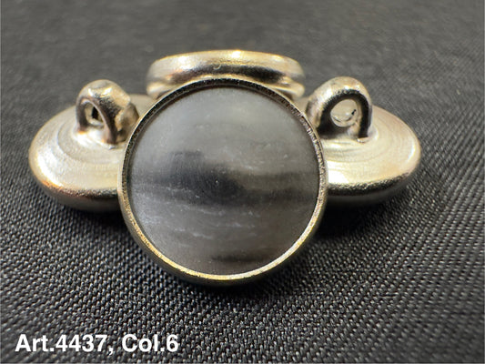 Buttonology Inc metal shank buttons close up showing urea shank buttons with round design