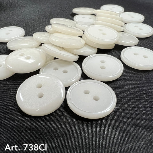 White two hole sewing buttons from Buttonology Inc in various sizes for crafting and garment repair