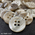 Pearl-colored 4-hole plastic buttons with a glossy finish by Buttonology Inc