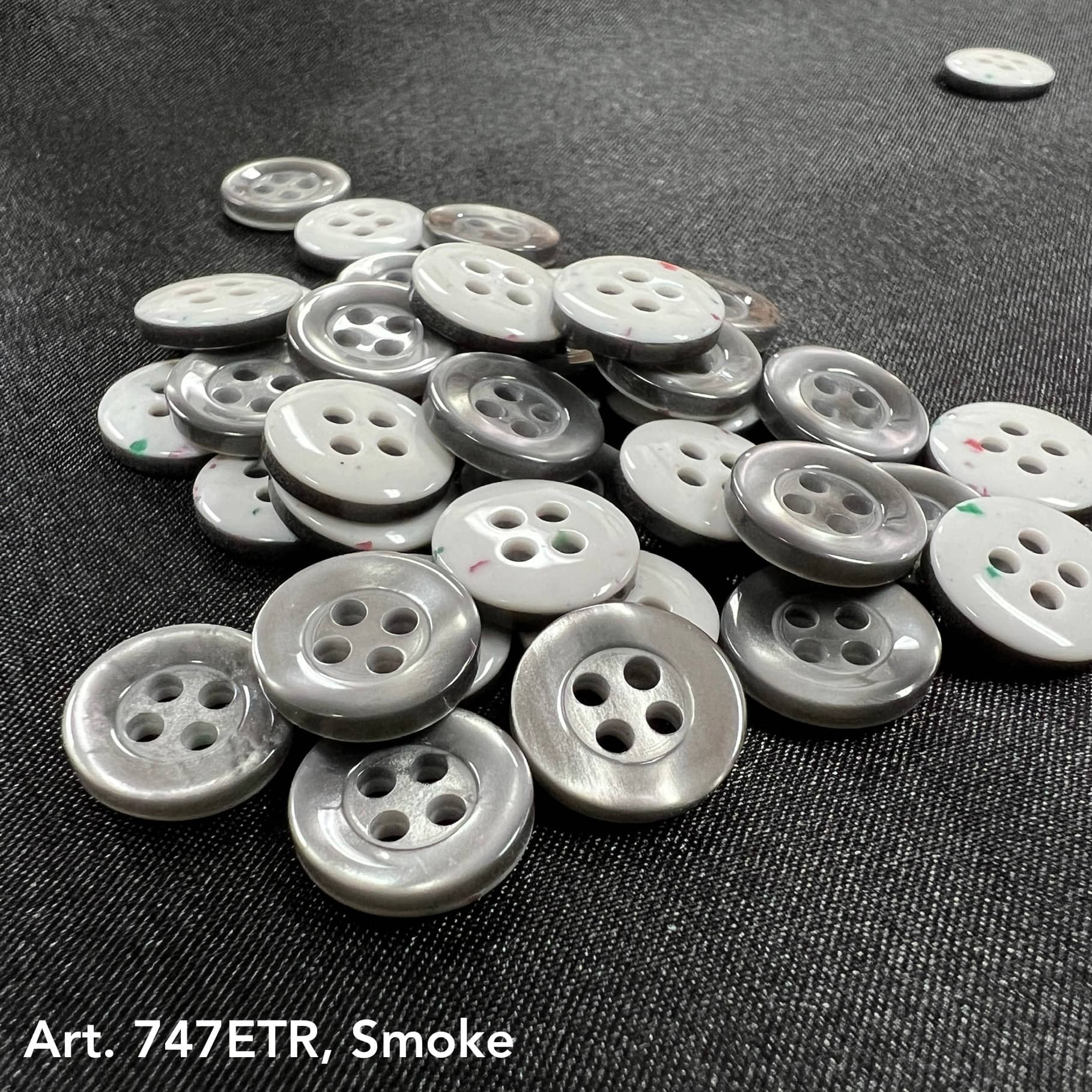 Gray 4 hole sewing buttons for clothing by Buttonology Inc. in various sizes and styles