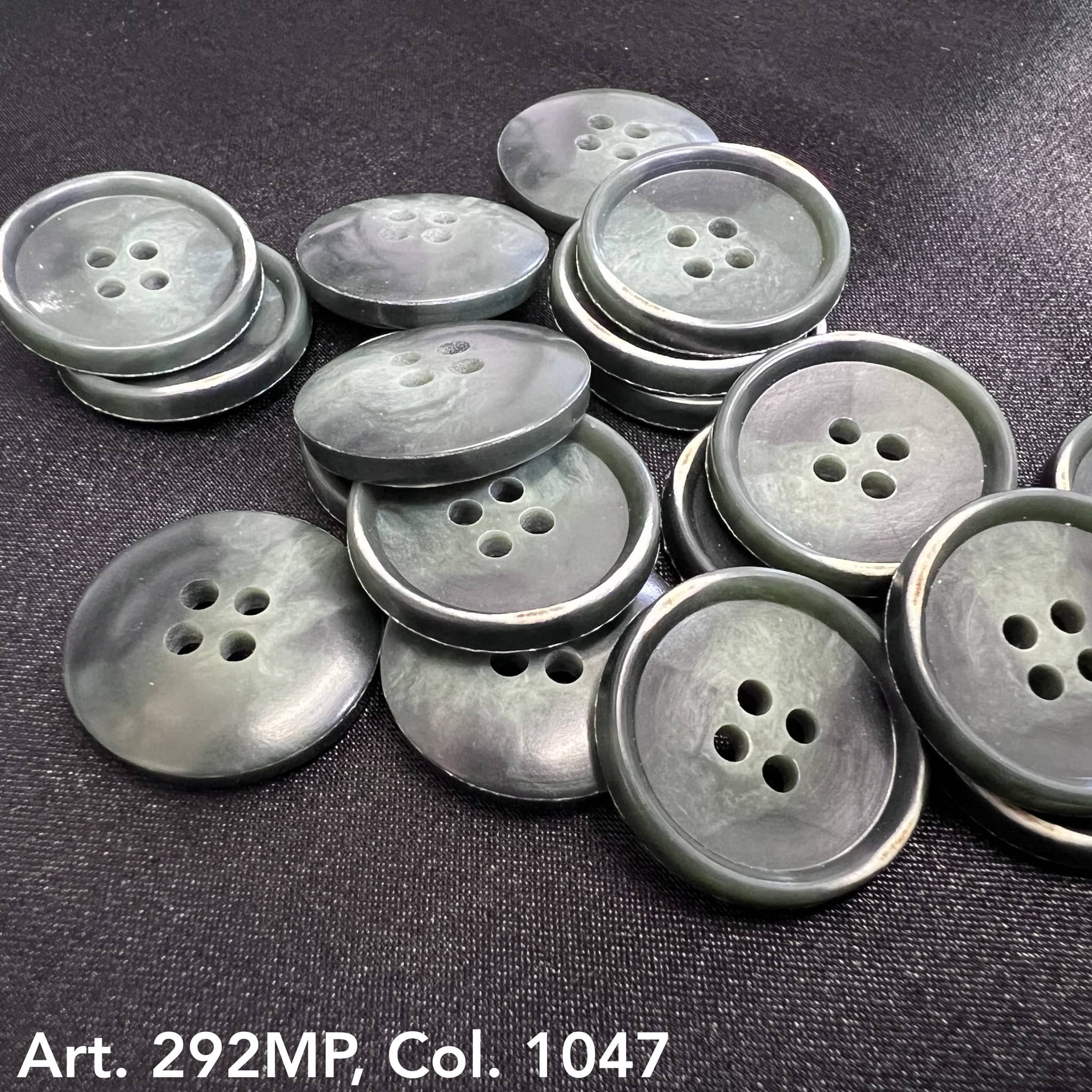 Collection of 4-hole suit buttons in dark green by Buttonology Inc for stylish tailoring