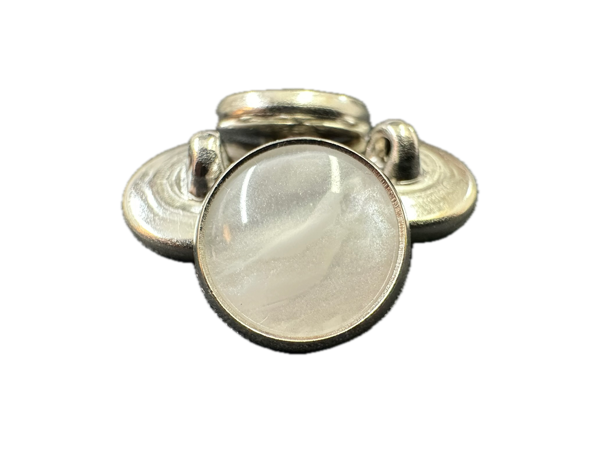 Round silver ring with a clear gemstone on a white background
