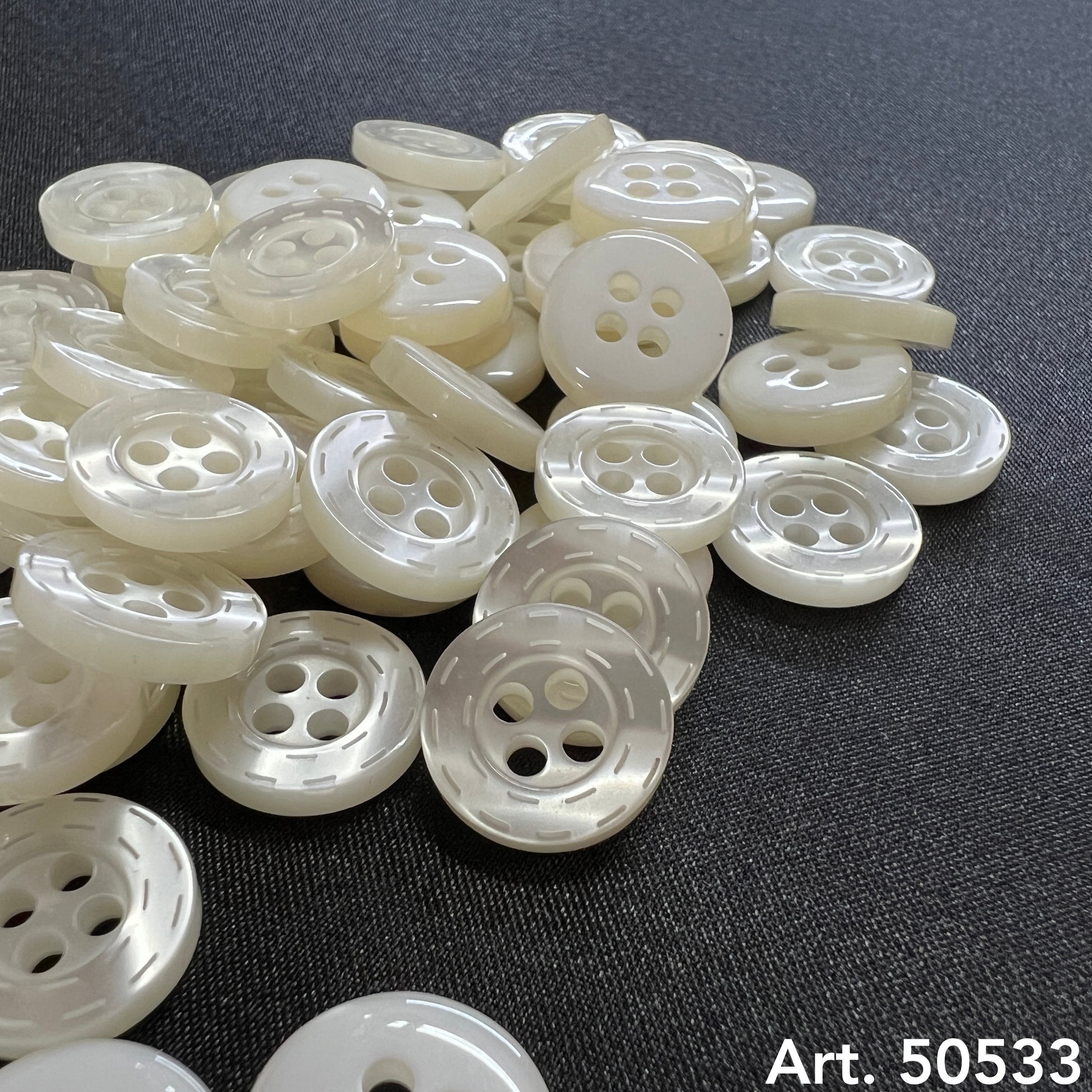 Art. 50533 - Buttonology Inc.