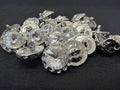 Collection of crystal buttons on a black background