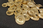 Gold buttons on a black background