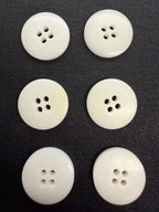 Natural corozo buttons 18mm with visible grain, set of nine - Art. 10417