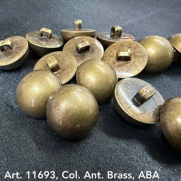 Antique brass shank buttons for jackets by Buttonology Inc displayed on dark fabric
