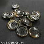 Premium sewing buttons online by Buttonology Inc four-hole round grey and brown buttons on black fabric