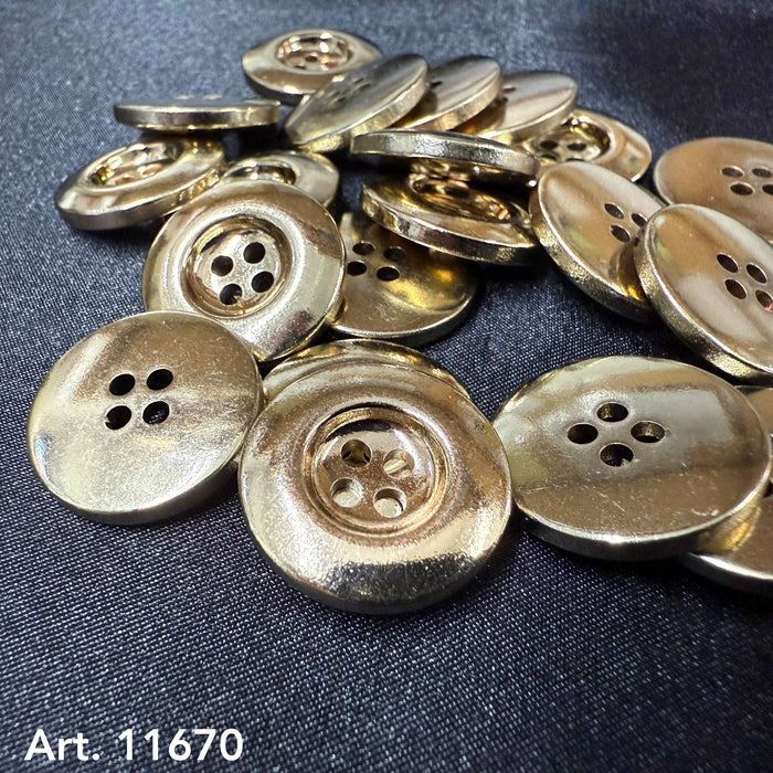 shiny Gold Plated Nylon sewing buttons by Buttonology Inc round four hole metal look buttons on black fabric