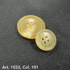 Buttonology Inc sustainable real horn buttons in two sizes on black fabric background