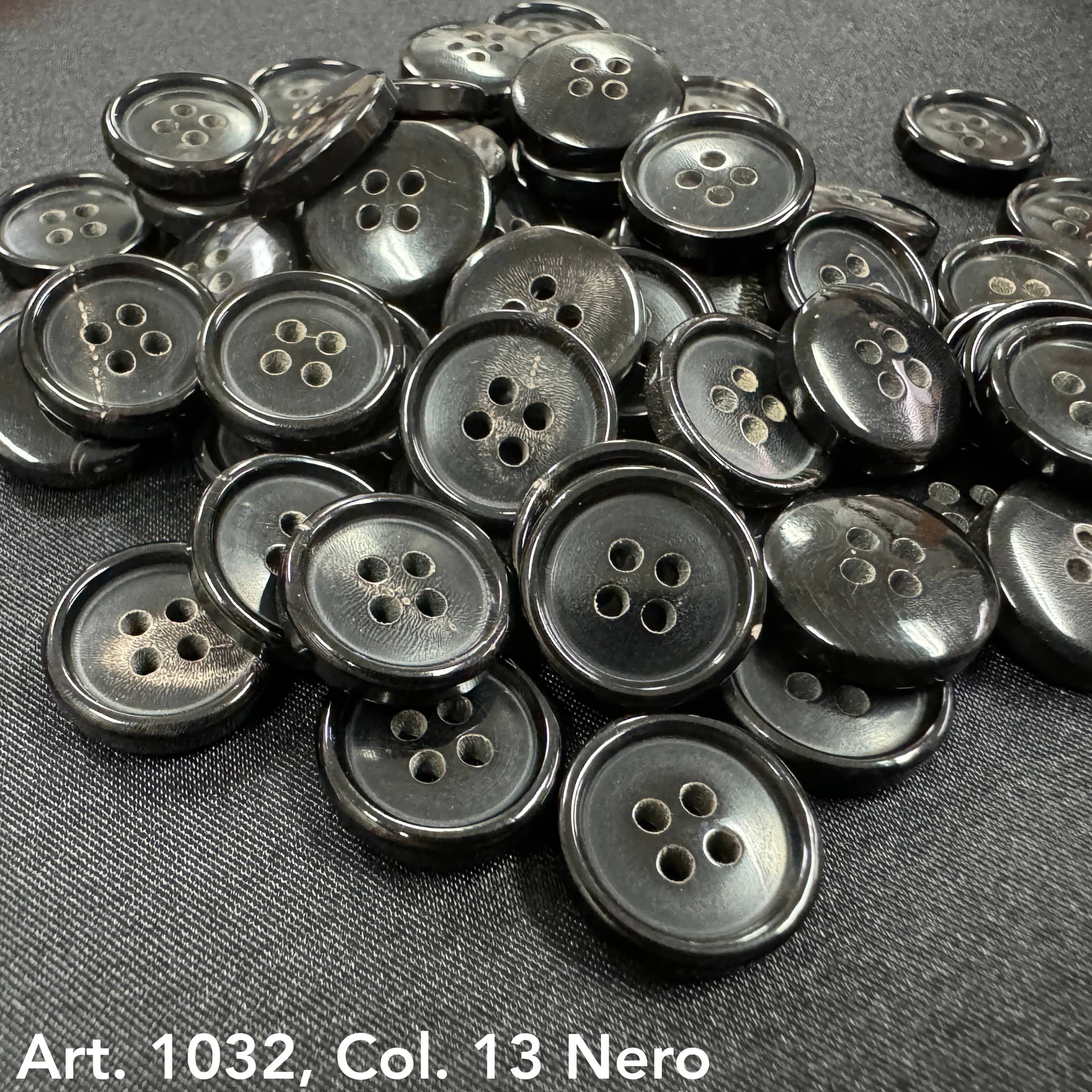 Sustainable real horn buttons by Buttonology Inc in glossy black with four holes for sewing