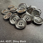 Art. 4527 shiny black polyester 4-hole sewing buttons, sizes 14L–54L – Buttonology Inc.