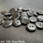 Art. 128 shiny black polyester 2-hole sewing buttons, sizes 14L–80L – Buttonology Inc.