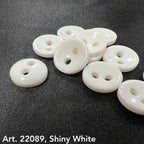 Buttonology Inc shiny white round buttons on black fabric Art 22089 glossy discs buy shiny black buttons online