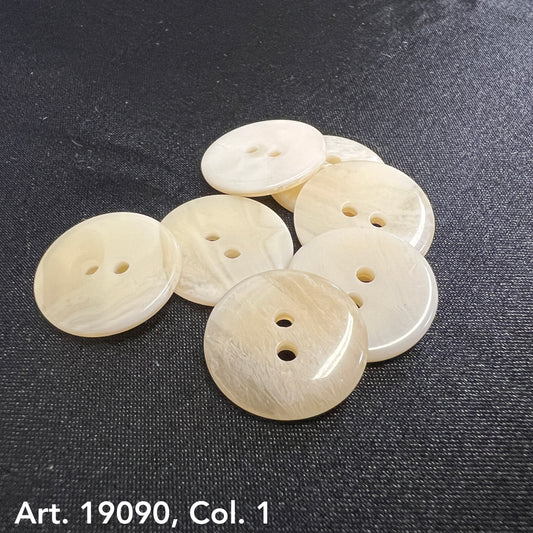 Buy Two Hole Buttons Online from Buttonology Inc shiny cream round buttons on black fabric