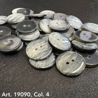 Buy Two Hole Buttons Online gray marbled buttons by Buttonology Inc scattered on black surface