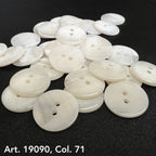 White two hole buttons from Buttonology Inc on black surface buy two hole buttons online