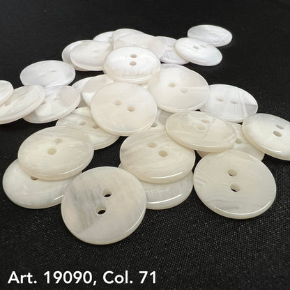 White two hole buttons from Buttonology Inc on black surface buy two hole buttons online